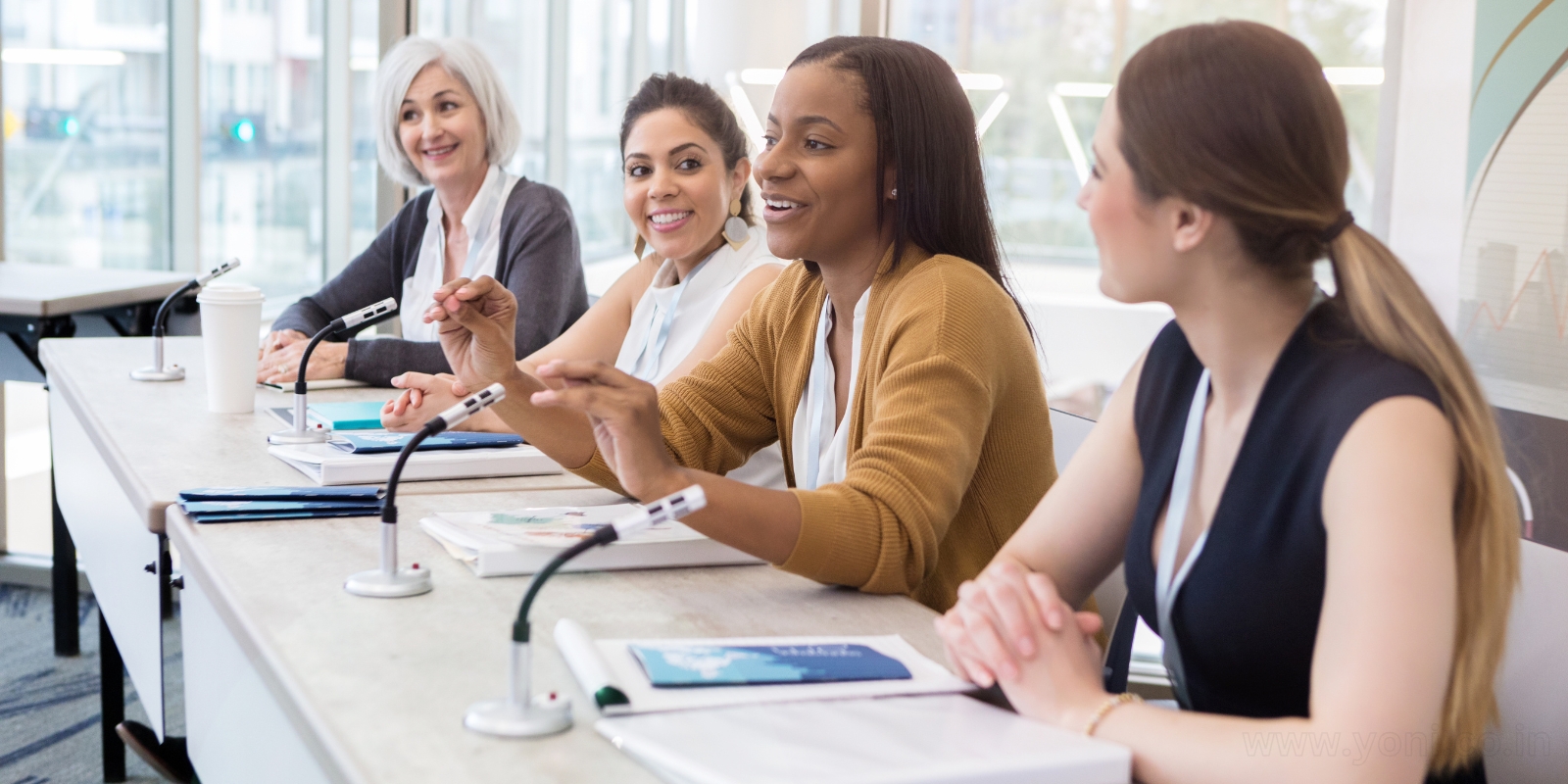 Empowered woman leading a team with confidence, illustrating a strong leadership mindset